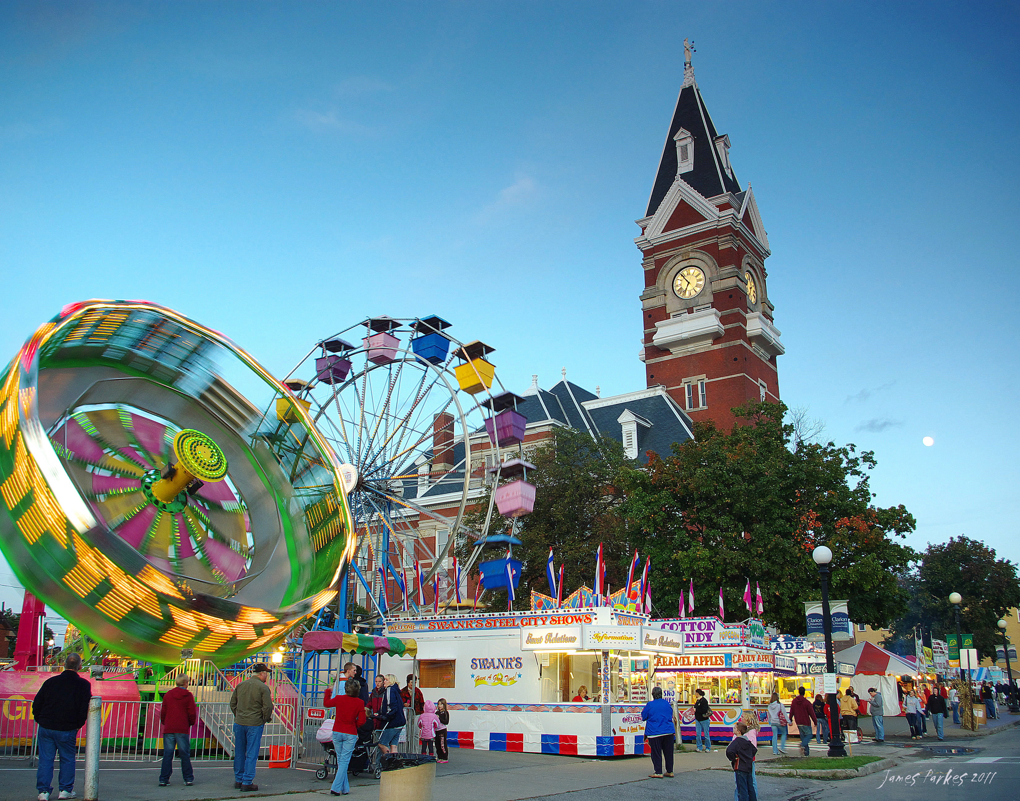 Clarion County Courthouse and Festival carnival at dusk