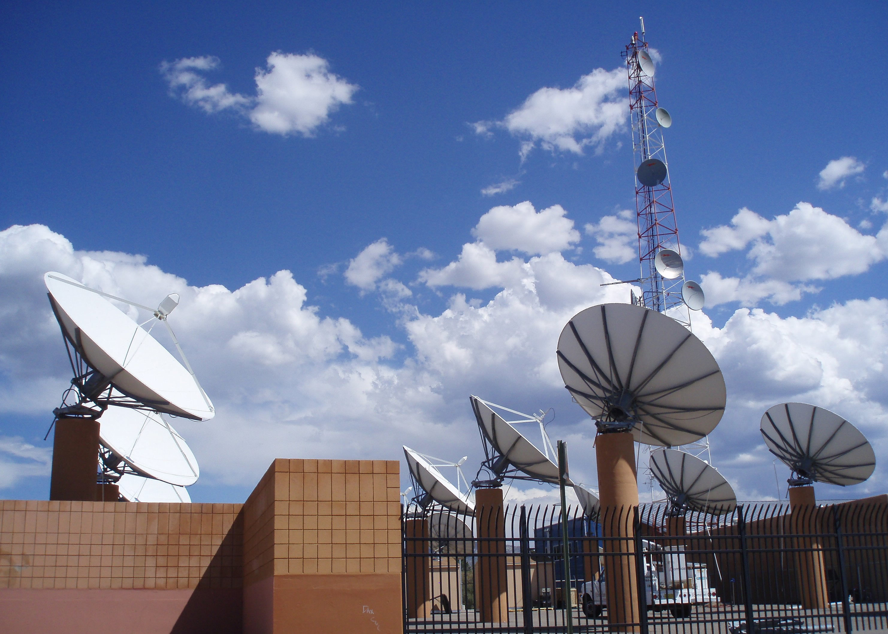 Cable facility with satellite dishes