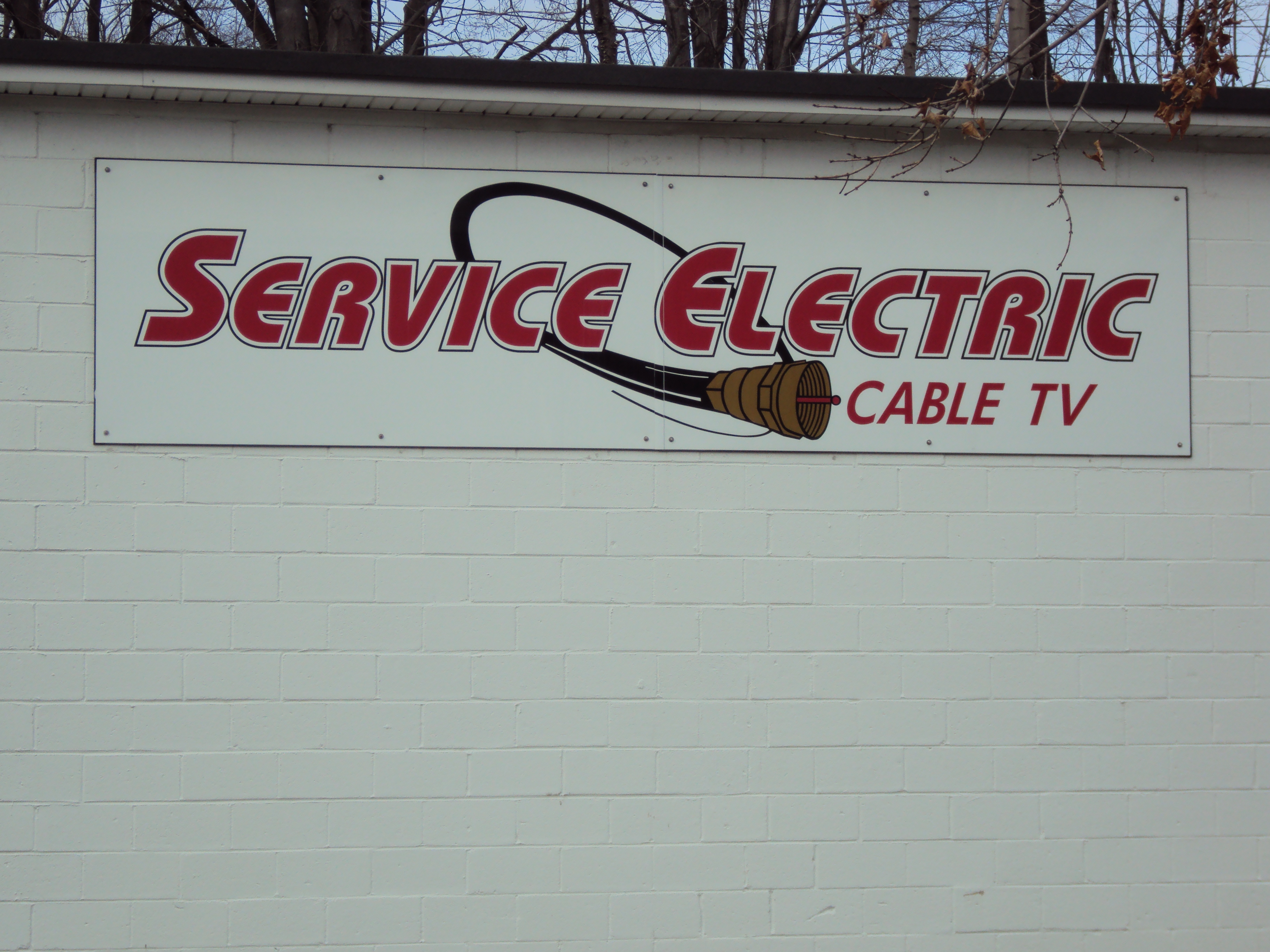 Service Electric Logo showing co-axial cable