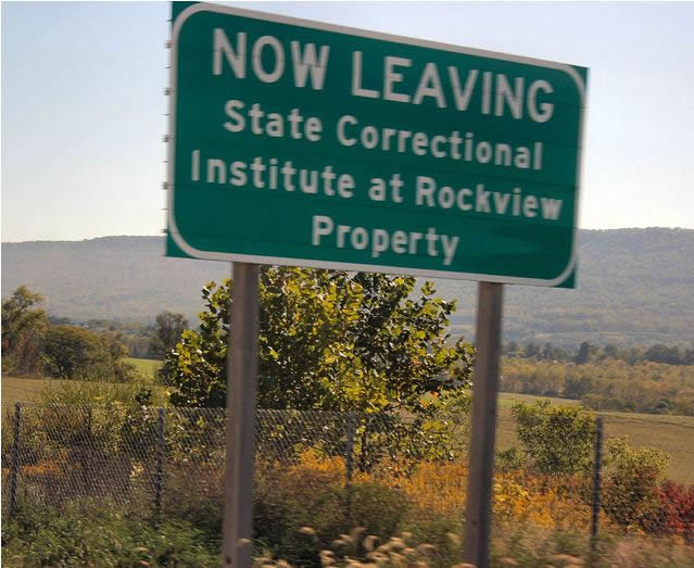 Warning sign on a highway indicating the extent of the Rockview Property