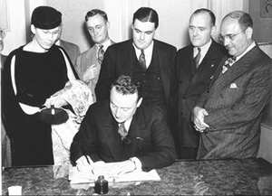 Gov. Earle signing for Byberry's acquistiton