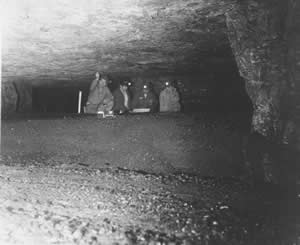 Miners viewing the pillars that support the surface