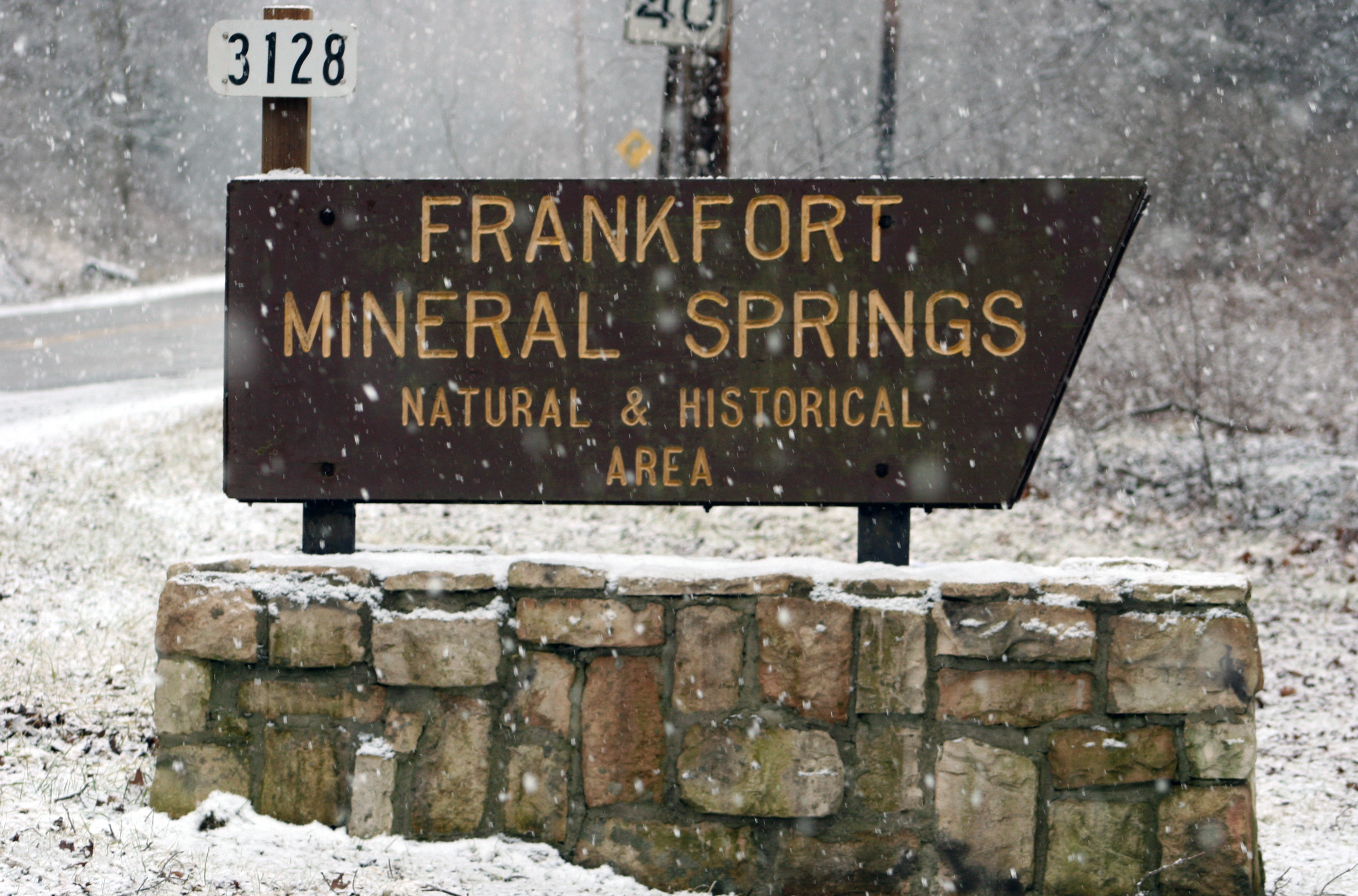 Parks welcome sign to Frankfort Mineral Springs in the winter