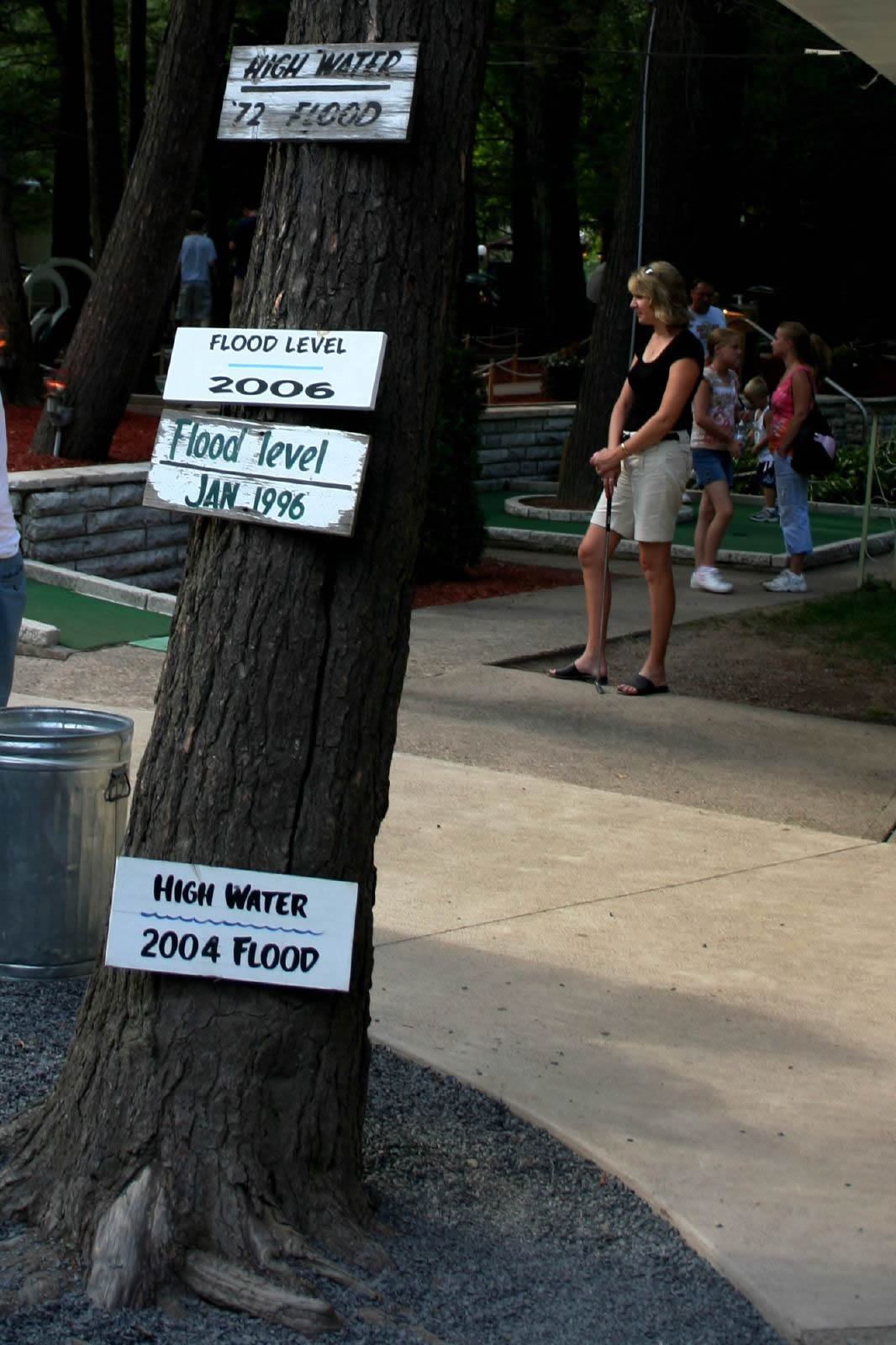 Signs showing relative water levels in floods through the years at Knoebels