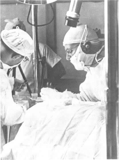 Dr. Warren Reese performing an operation