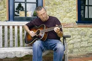 Eric Clapton Playing a Martin Guitar