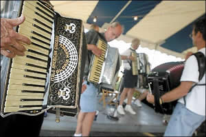 Accordions playing polkas at Slovenefest
