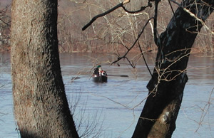 A rowboat crossing the Delaware River